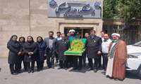 در دهه کرامت ، پرچم متبرک حرم رضوی در دانشکده دندانپزشکی